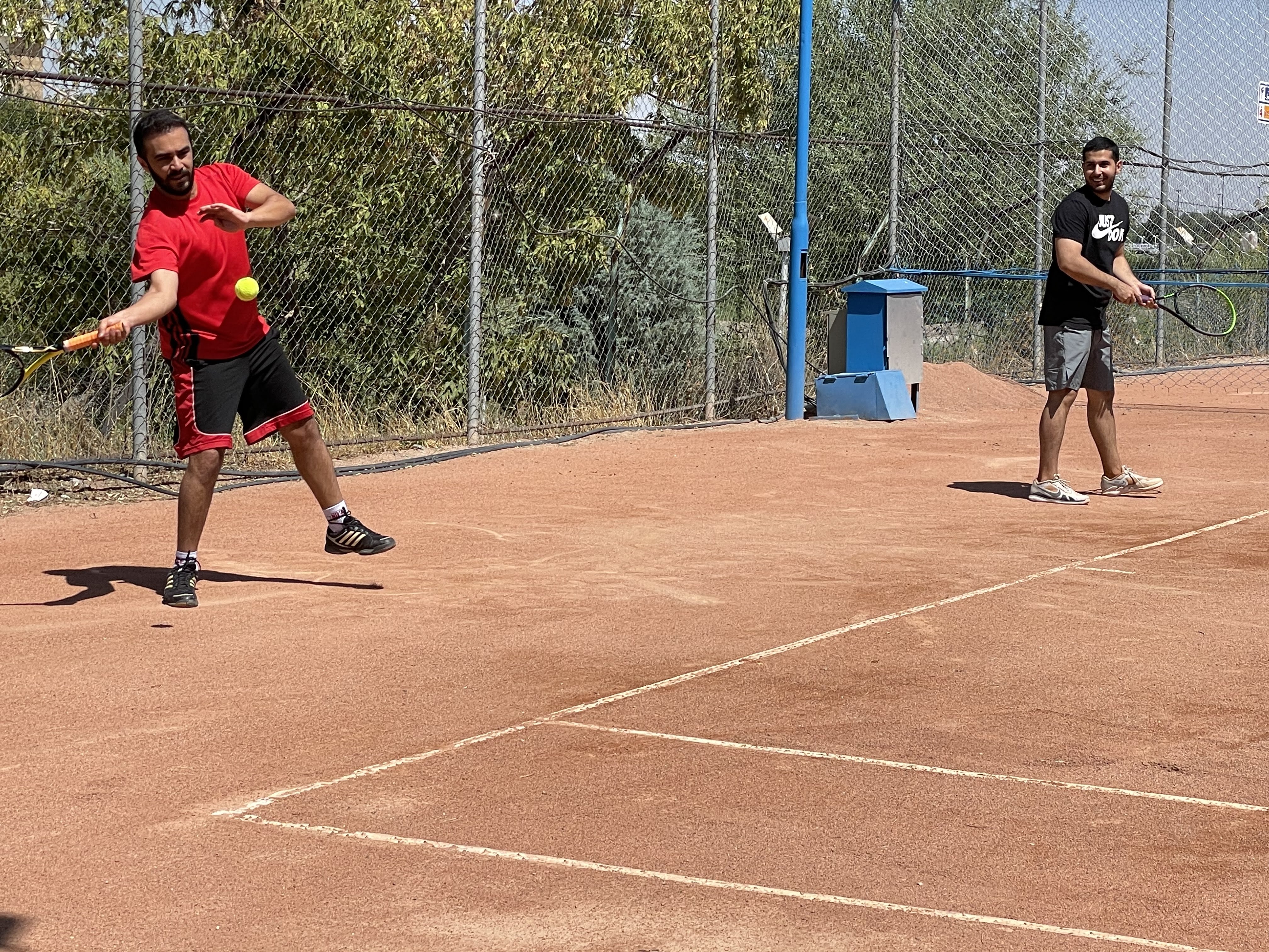 Playing tennis